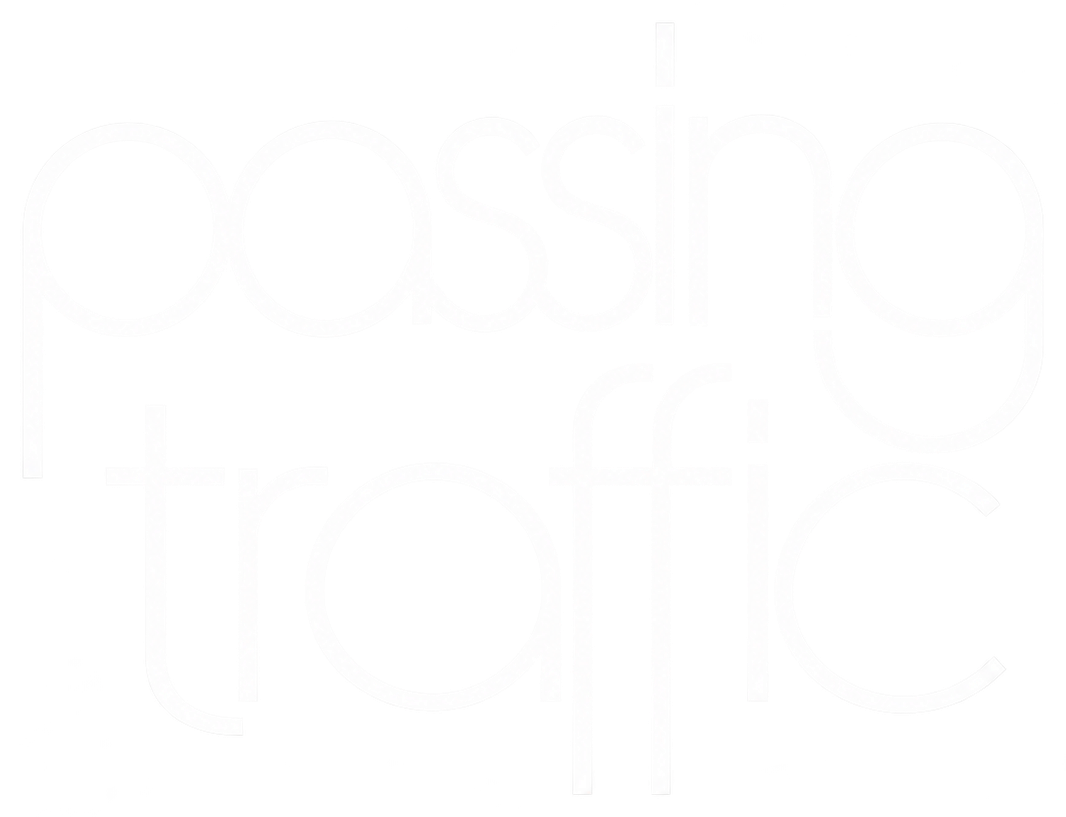 PASSING TRAFFIC logo